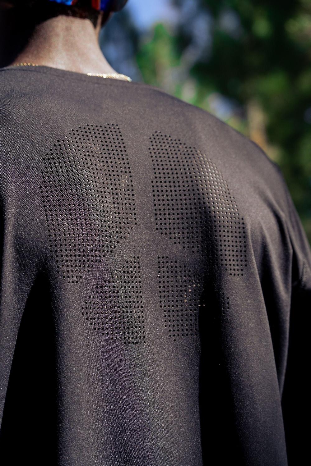 District Vision Ultralight Aloe Short Sleeve Tee Black Wordmark