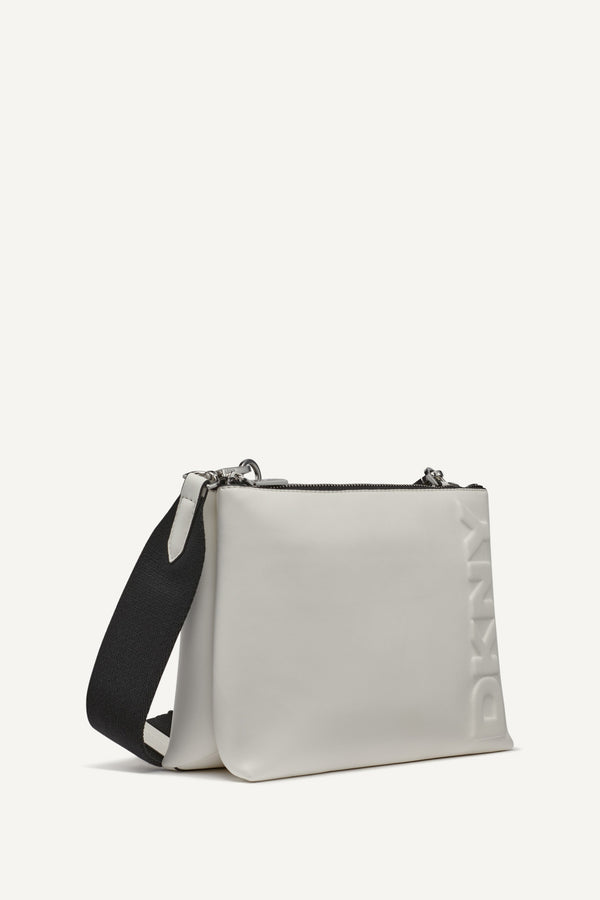 Dkny TINSLEY LOGO EMBOSSED CROSSBODY BAG Marshmallow