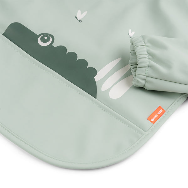 Done By Deer Sleeved Pocket Bib - Croco - Green