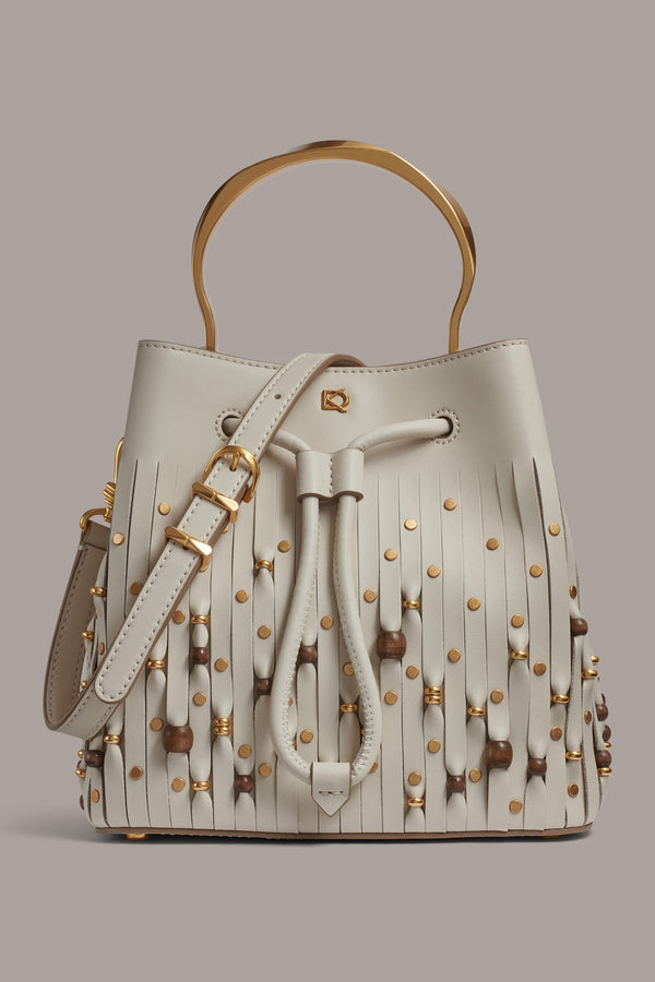 donna karan LAWRENCE BEADED LASER-CUT BUCKET BAG Sand