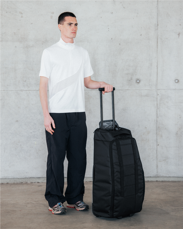 Douchebags Hugger Roller Bag Check-in 60L Black Out