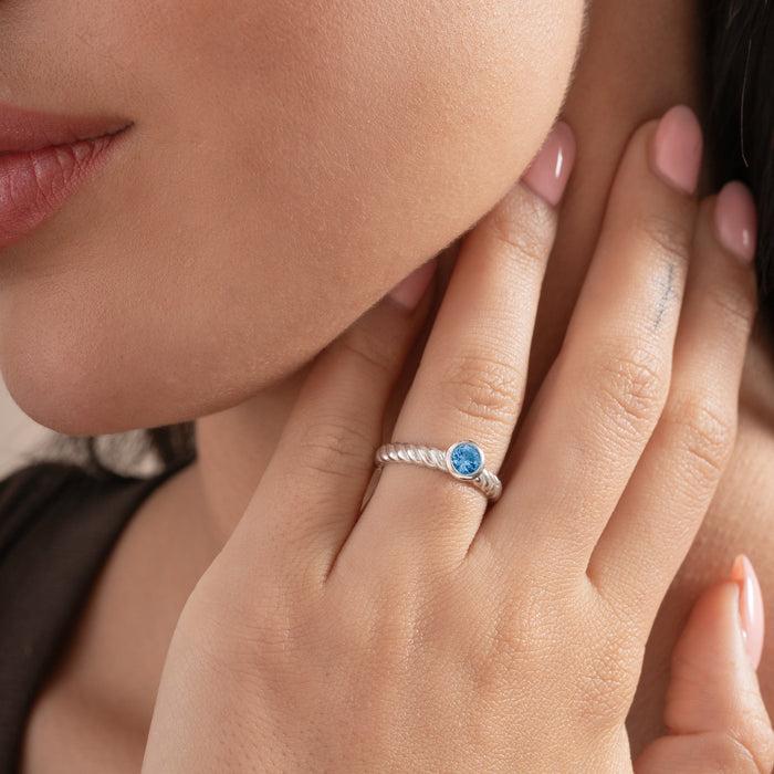 Dower & Hall 5mm Blue Topaz Twist Twinkle Ring