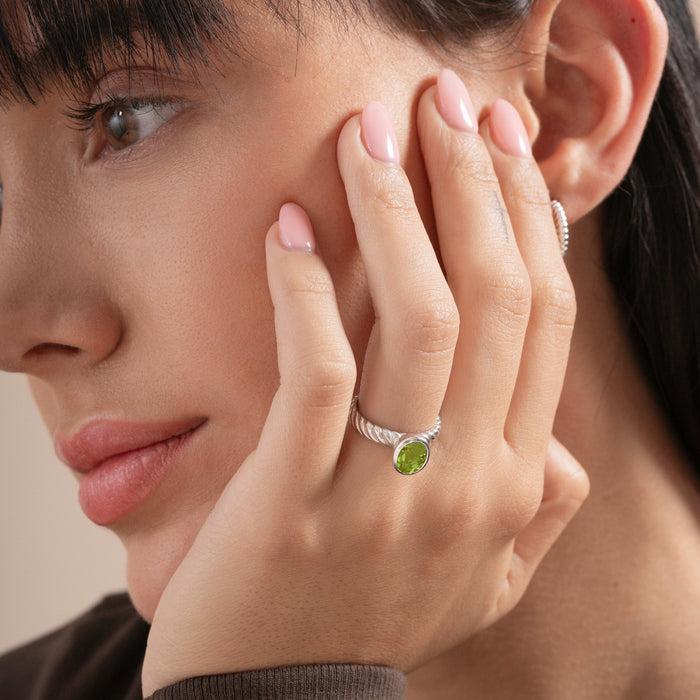 Dower & Hall Oval Peridot Twist Twinkle Ring
