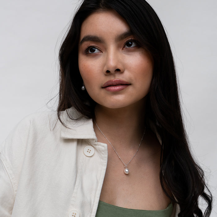 Dower & Hall Timeless Adjustable 10mm Oval White Freshwater Pearl Pendant