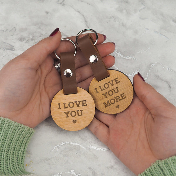 Dust And Things Engraved 'I Love You / More' Keyring Pair For Couples