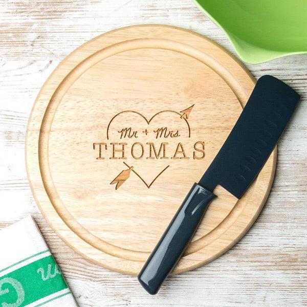 dust and things Personalised Heart And Arrow Round Chopping Board