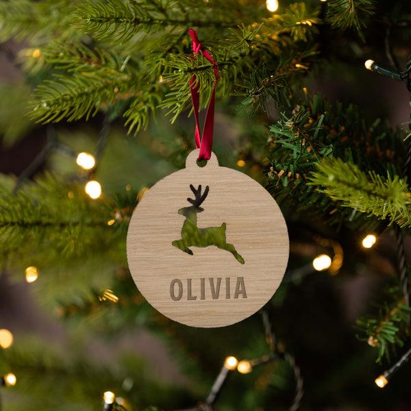 dust and things Personalised Wooden Reindeer Christmas Bauble For Kids
