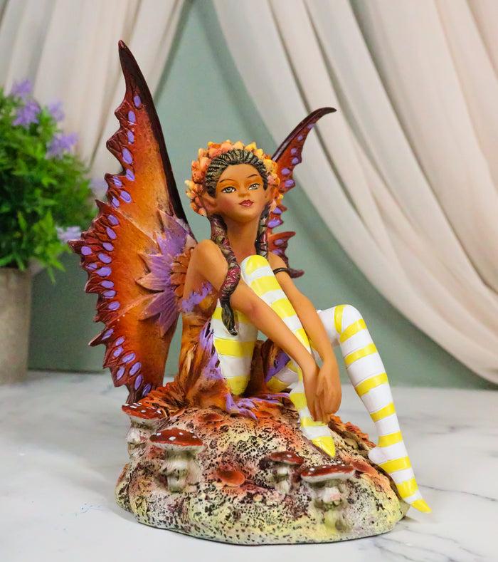 ebros gift Amy Brown Fantasy Fall Ebony Fairy Sitting On Rock Garden Autumn Winds Figurine
