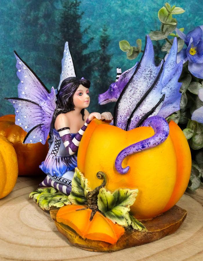 ebros gift Amy Brown Halloween Hide and Seek Lavender Fairy And Dragon In Pumpkin Figurine