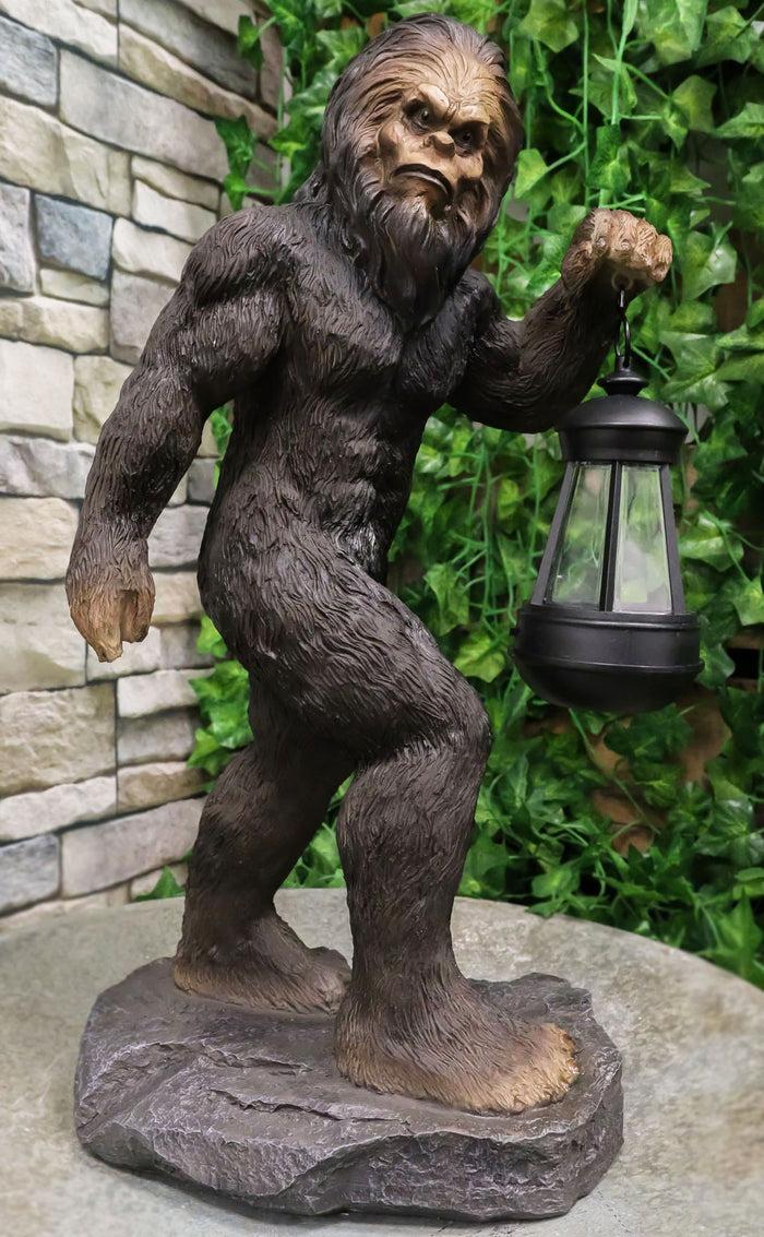 ebros gift Bigfoot Sasquatch Mythical Legend Ape Man Creature Carrying LED Lantern Statue