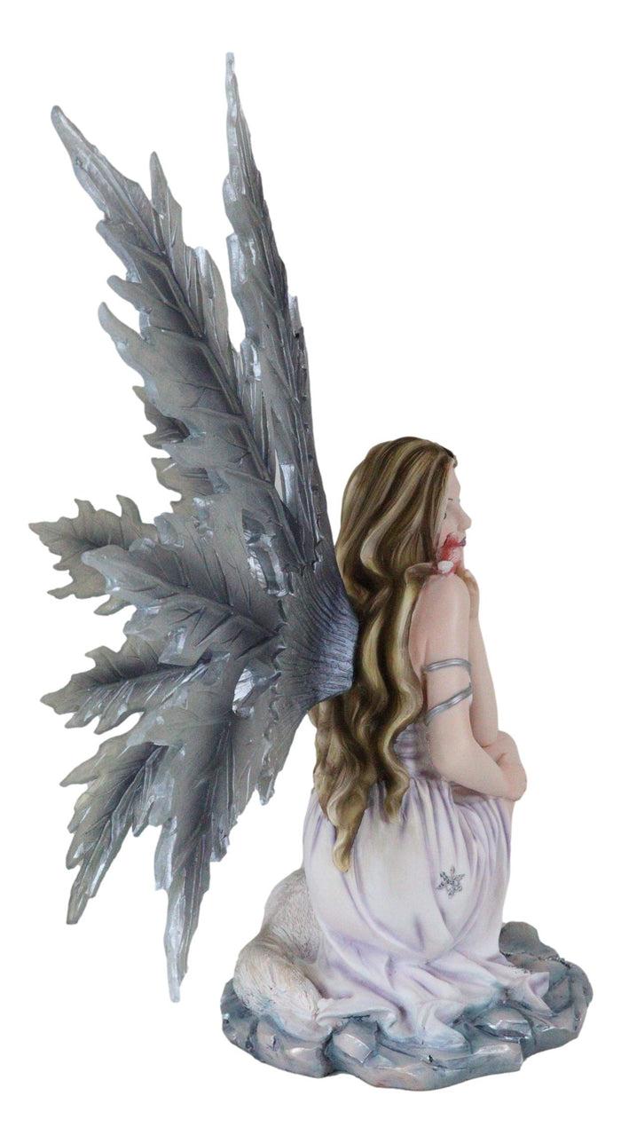 Ebros Gift Blue Frozen Ice Fairy With Frost Flake Wings Crouching By Snow Wolf Pup Figurine