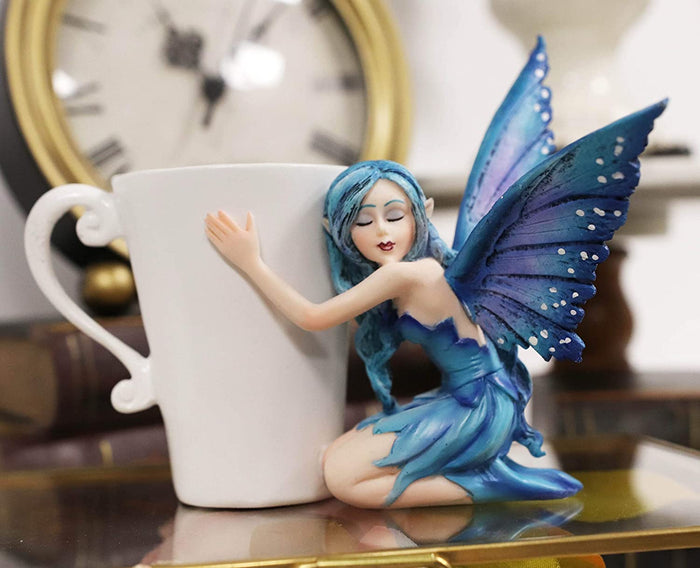 ebros gift Ebros Amy Brown Warmth Comfort Blue Fairy Hugging Tea Cup Statue 4.25"H Fantasy
