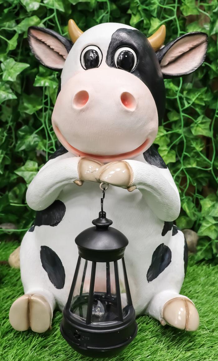 ebros gift Ebros Country Farm Whimsical Holstein Cow Statue Holding Solar LED Lantern Light 14"H