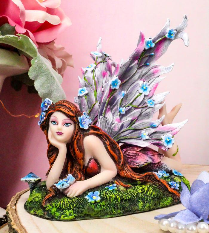 ebros gift Ebros Enchanted Garden Meadows Blue Peony Fairy With Purple Wings Sunbathing Figurine