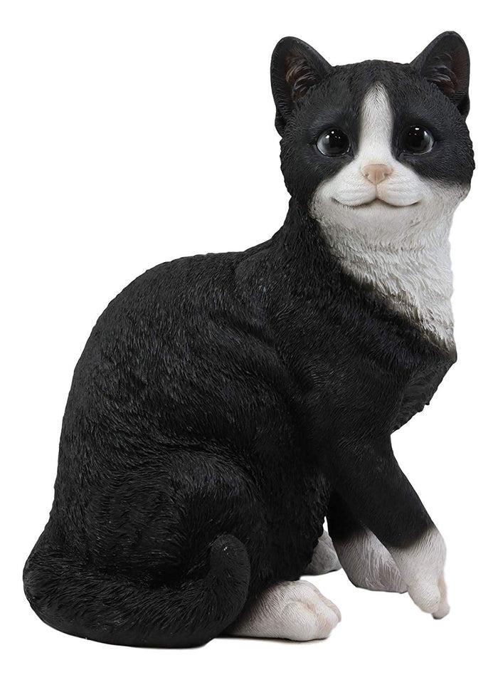 Ebros Gift Ebros Lifelike Sitting Tuxedo Black And White Cat With Paw Up Statue 10.25" Tall Realistic Glass Eyes Hand Painted Feline Cats Kittens Kitties Animal Pet Sculpture Decor Figurine