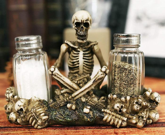 ebros gift Ebros Meditating Skeleton On Graveyard Of Skulls Salt & Pepper Shakers Holder