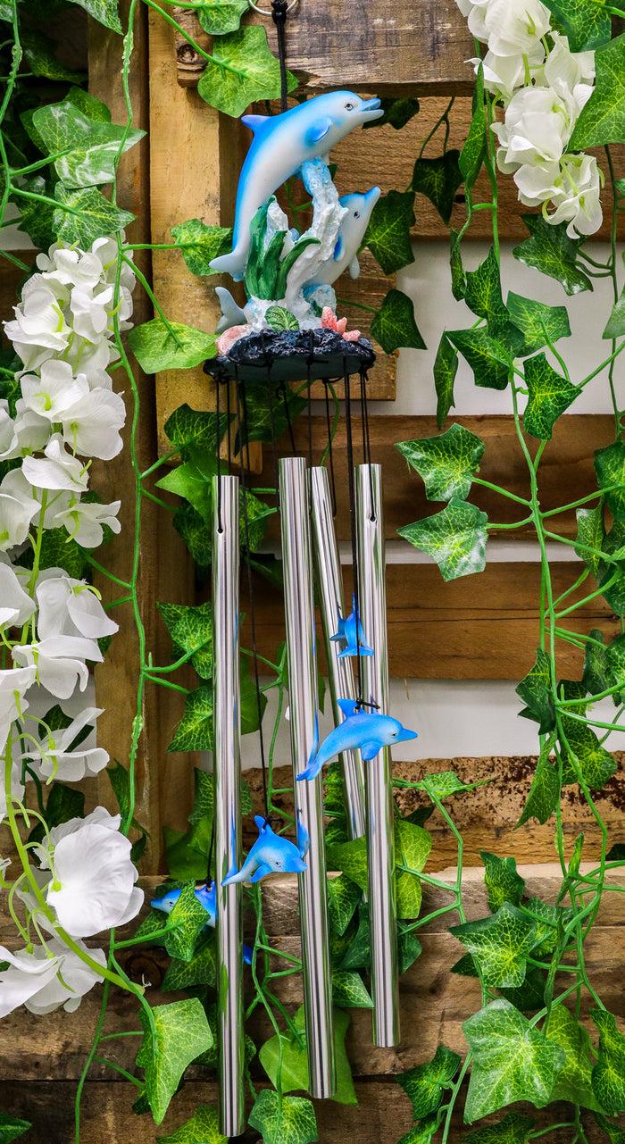 ebros gift Ebros Nautical Marine Dolphin Family Swimming by Coral Reef Wind Chime 21" Long Resin Crown with Aluminum Rods Home Patio Garden Decor of Dolphins Under The Sea Life Decorative Noisemakers