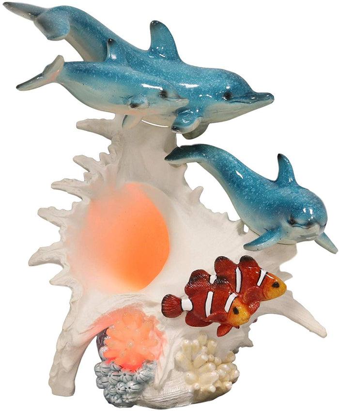 Ebros Gift Ebros Nautical Ocean Family 3 Dolphins Swimming Over Giant Sea Conch Clownfishes And Anemones Statue With Colorful LED Light 9.5" Tall