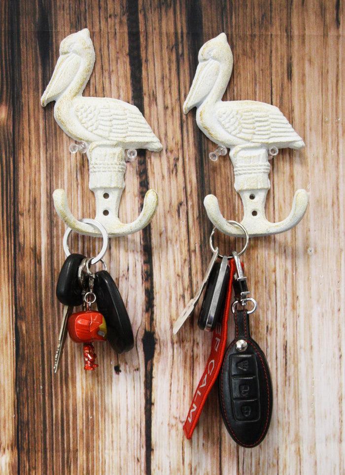 ebros gift Ebros Set of 2 Cast Iron Nautical Beach Port New Orleans White Pelican Bird Perching On Getty Post Wall Hooks 6" Tall Hanger Coastal Themed