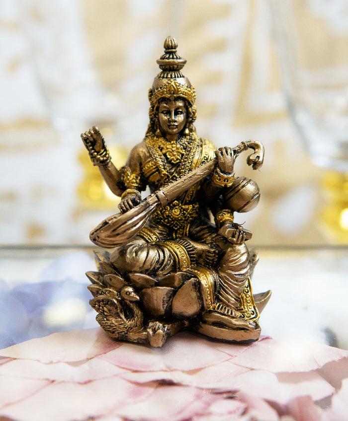 ebros gift Ebros Vastu Hindu Goddess Saraswati Seated On Lotus Playing Veena Guitar Statue
