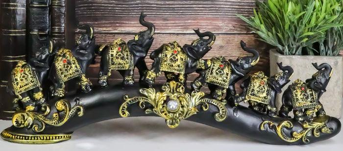 ebros gift Elephant Herd On Great Migration On Black Tusk With Golden Scrollwork Figurine
