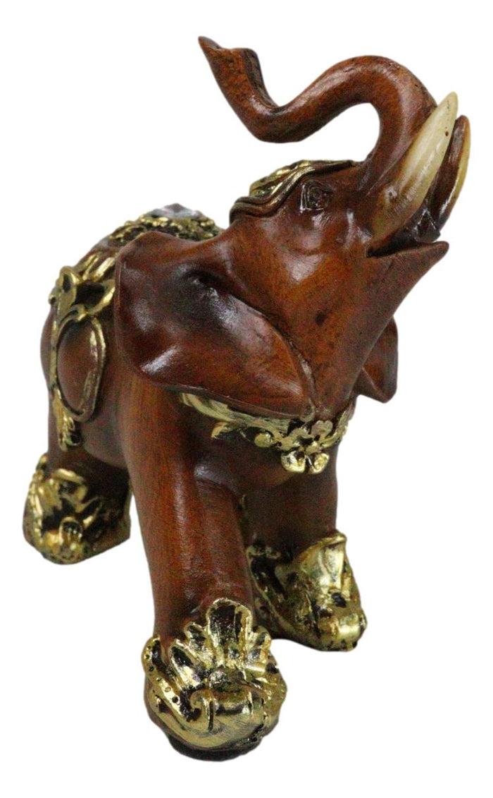 Ebros Gift Feng Shui Faux Wood Left Facing Trunk Up Elephant With Golden Tapestry Figurine