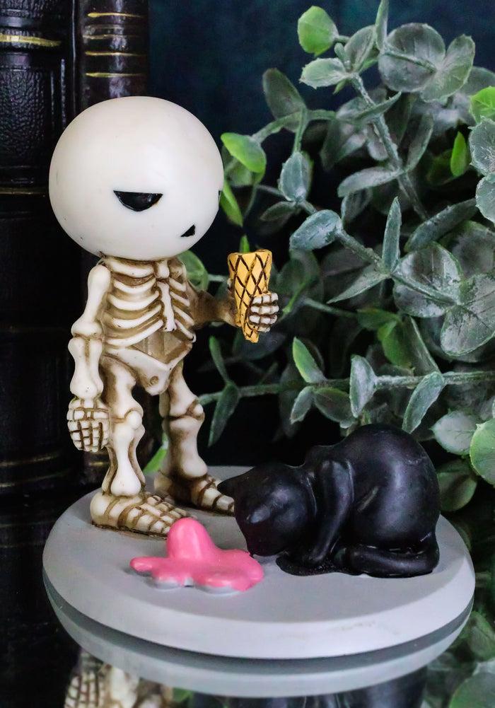 ebros gift Lucky The Skeleton Boy Dropping His Ice Cream By Mystical Black Cat Figurine