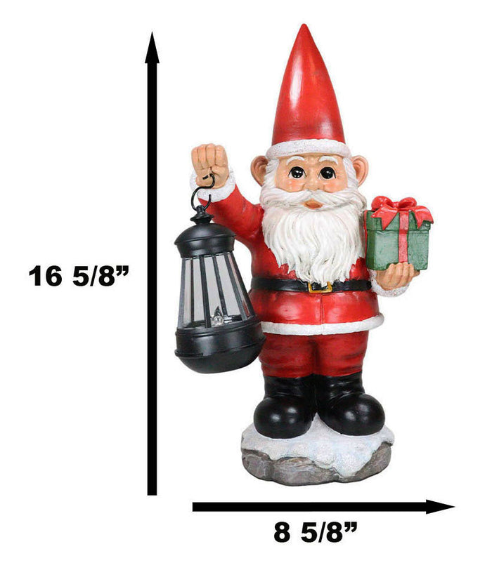 Ebros Gift Merry Christmas Santa Claus Holding Gift And Solar Colorful LED Lantern Statue
