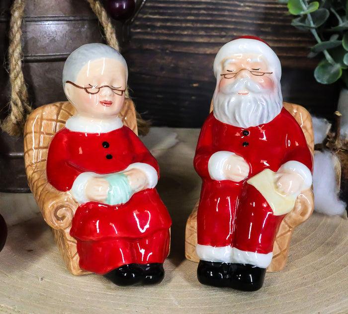 ebros gift North Pole Winter Christmas Mr Mrs Santa On Sofa Ceramic Salt Pepper Shaker Set