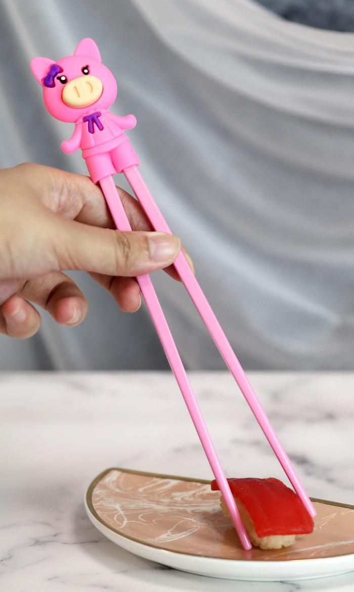 ebros gift Pink Ribbon Miss Piggy Pig Reusable Training Chopsticks Set With Silicone Helper
