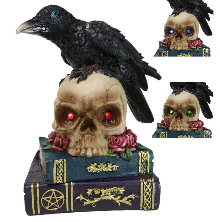 ebros gift Raven Crow Perching On Skull With LED Eyes And Spell Books Of Prophecy Figurine