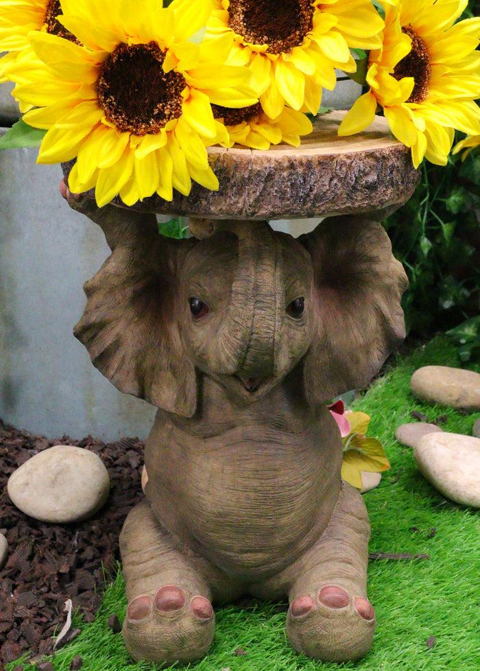 ebros gift Safari Jungle Baby Calf Elephant Holding Faux Wood Slice Table Stand Figurine