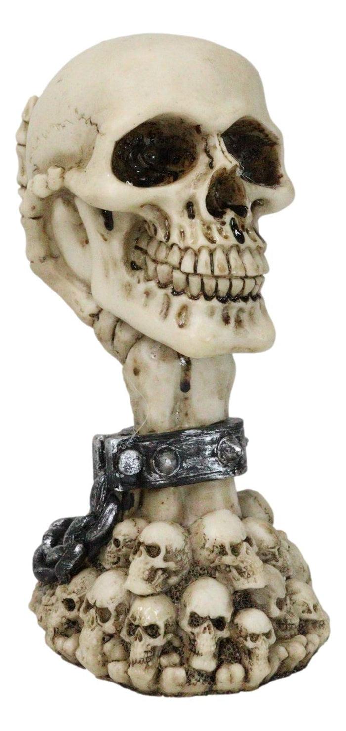 Ebros Gift Shackled Skeleton Hand Holding Skull With LED Eyes With Morphing Skulls Figurine