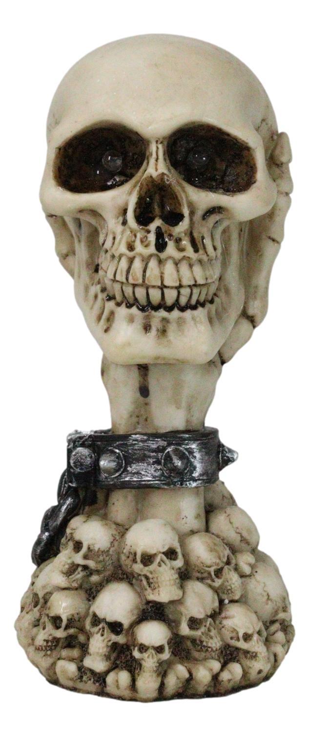 Ebros Gift Shackled Skeleton Hand Holding Skull With LED Eyes With Morphing Skulls Figurine