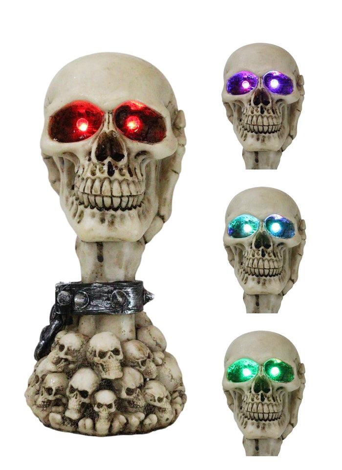 ebros gift Shackled Skeleton Hand Holding Skull with LED Eyes With Morphing Skulls Figurine
