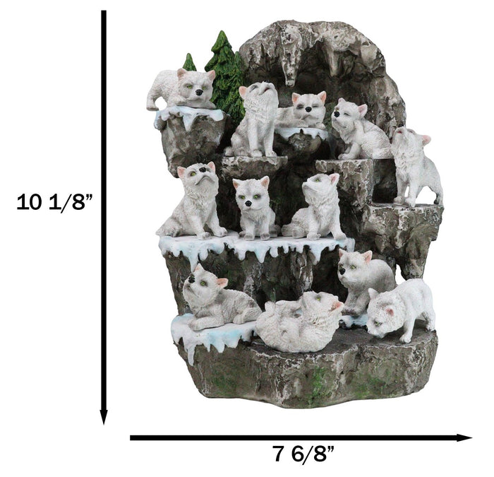Ebros Gift Snow Capped Wolf Den Rocky Cave Lair With Pine Trees LED Display Stand Sculpture
