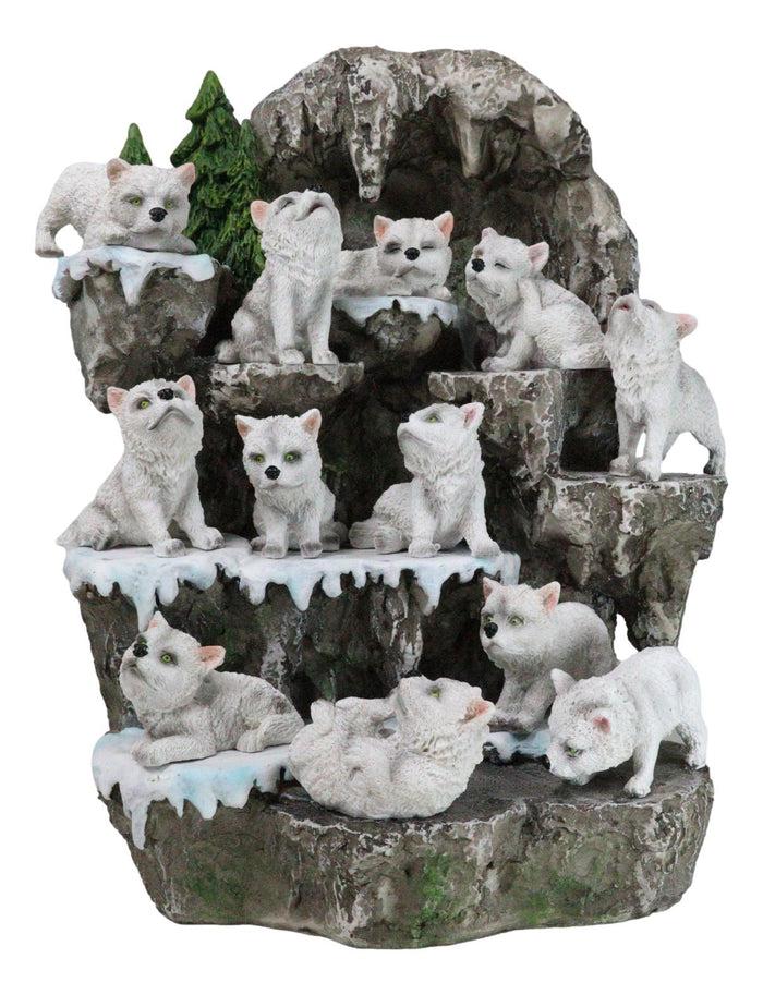 Ebros Gift Snow Capped Wolf Den Rocky Cave Lair With Pine Trees LED Display Stand Sculpture