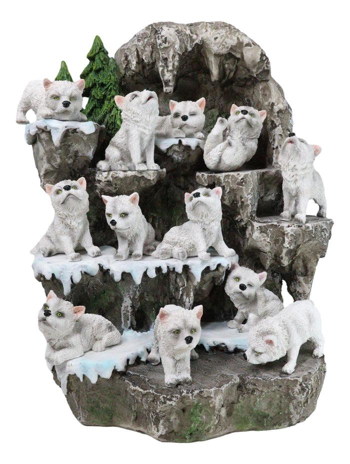 ebros gift Snow Capped Wolf Den Rocky Cave Lair With Pine Trees LED Display Stand Sculpture