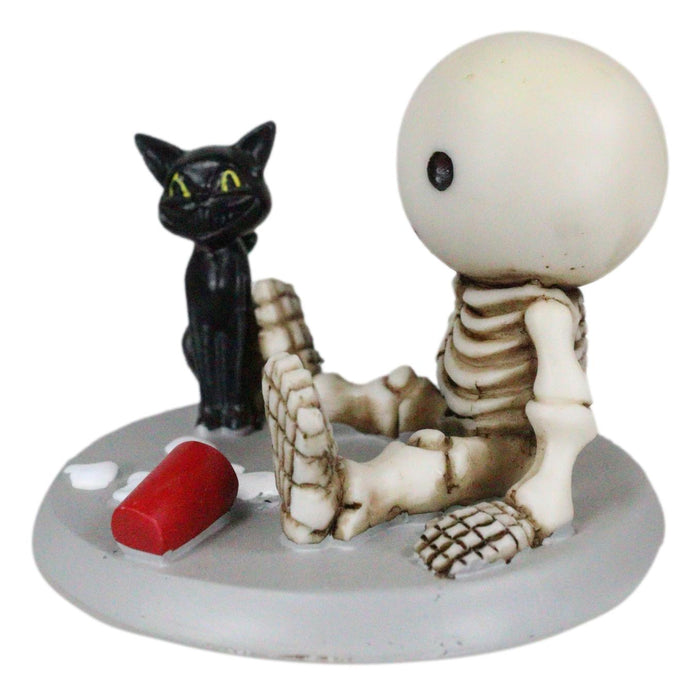 Ebros Gift Unfortunate Skeleton Boy Lucky Sitting By Spilled Milk And Black Cat Figurine