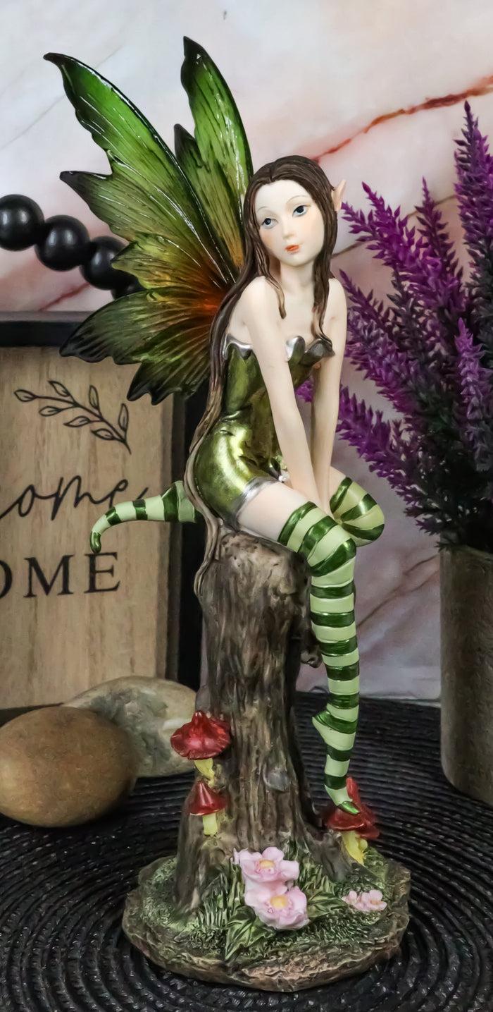 Ebros Gift Whimsical Peppermint Elf Fairy Sitting On Tree Stump Statue 9.5"Tall Collectible