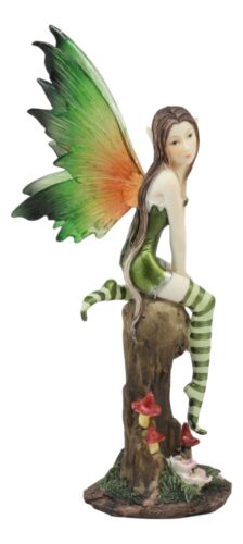 Ebros Gift Whimsical Peppermint Elf Fairy Sitting On Tree Stump Statue 9.5"Tall Collectible