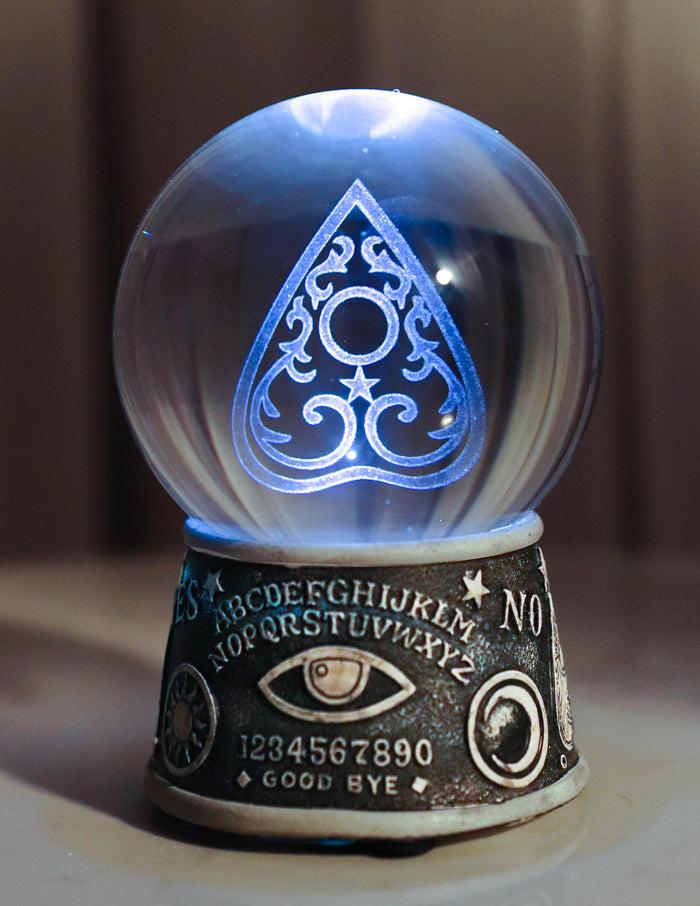 ebros gift Wicca Ouija Spirit Board Evil Eye Planchette LED Glass Gazing Ball Figurine