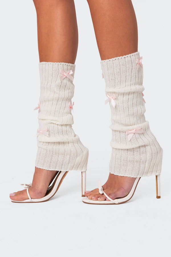 edikted Bow Leg Warmers white and pink
