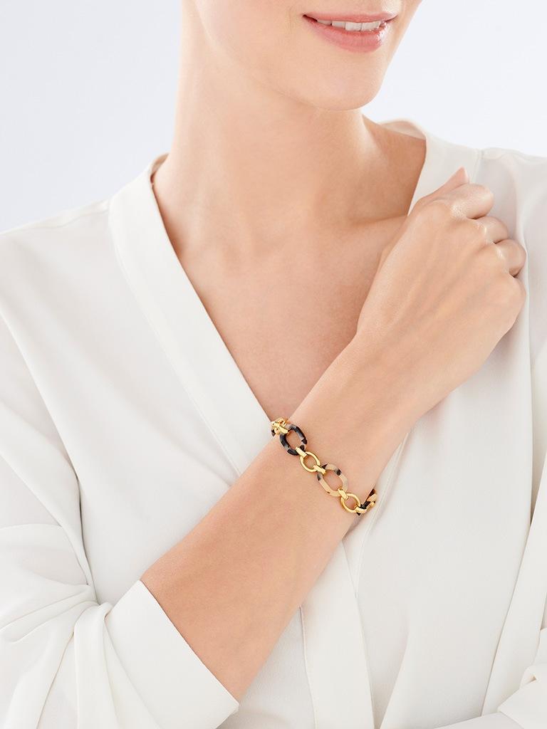 Elixa BRANSOLETKA ZE STALI SZLACHETNEJ Z DETALAMI Z MASY ŻYWICZNEJ EL532-9973