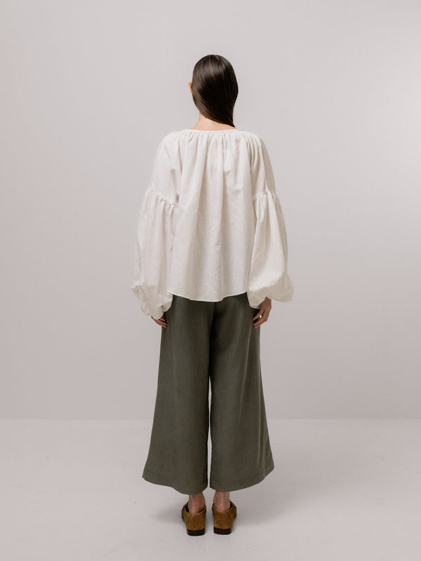 Emin Paul White Asymmetric Hem Blouse