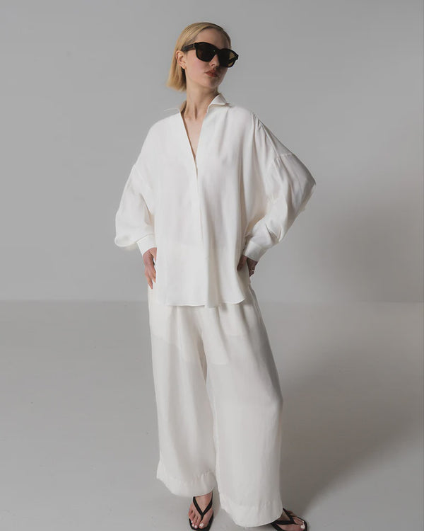 emin paul White Curved Hem Blouse