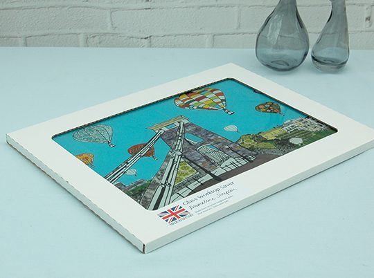 Emmeline Simpson Balloons Over The Toll Bridge Glass Worktop Saver