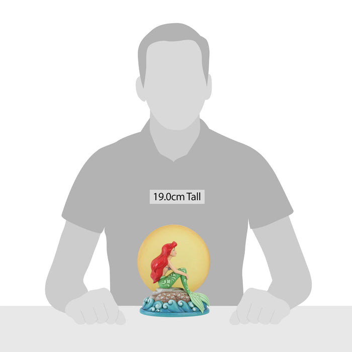 Endura Ariel Sitting On Rock By Moon