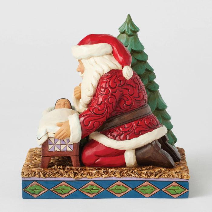 Endura Santa Kneeling Over Baby Jesus