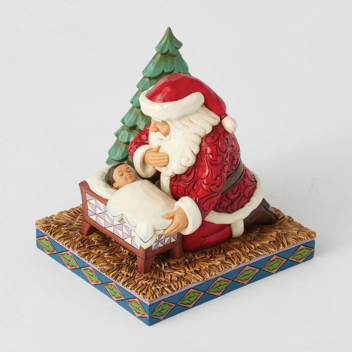 Endura Santa Kneeling Over Baby Jesus